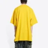 Balenciaga x THE SIMPSONS Büyük Beden Pamuklu Tişört “Yellow” 676589TLVG77200