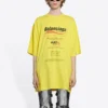 Erkek Balenciaga Kuru Temizleme Boxy Logo Baskılı Bol Kesim Kısa Kollu Sarı 651795TKVF87175